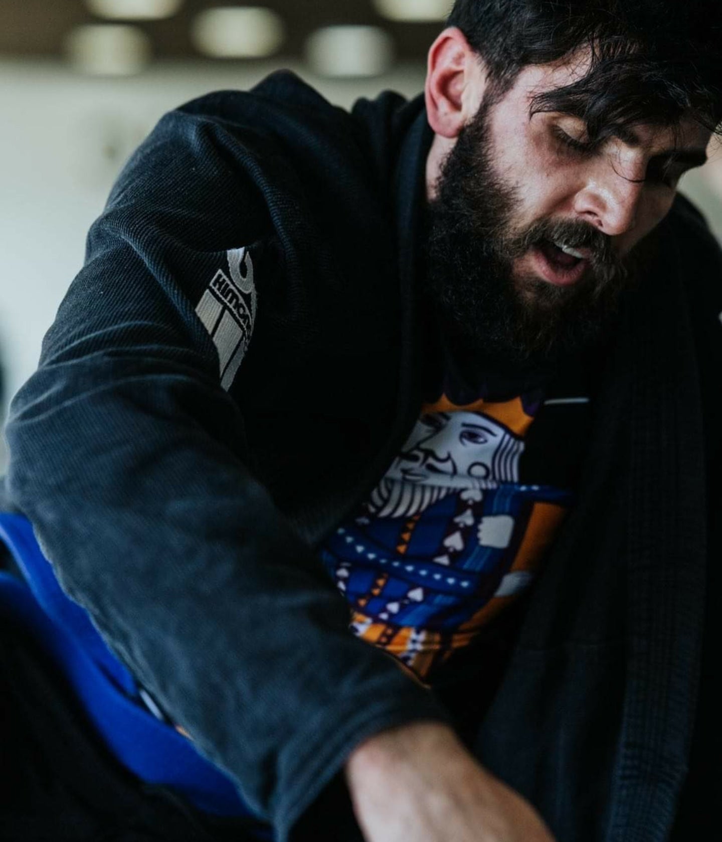 Black BJJ gi on the mats